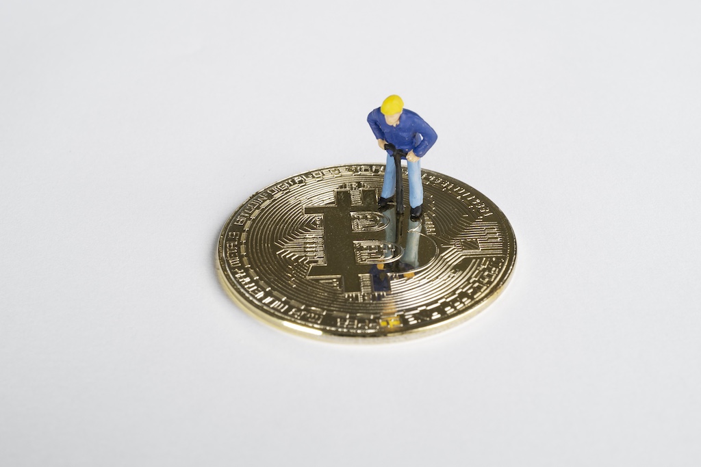 macro miner figures working bitcoin virtual cryptocurrency mining concept